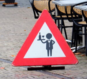 Be careful, waiters crossing the street